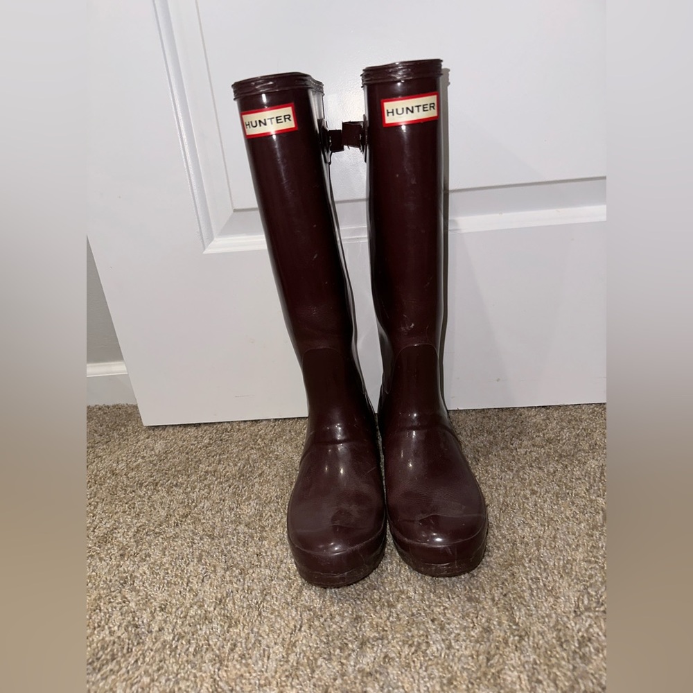 plum hunter boots. Size 6 with extended calf